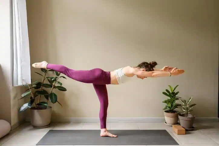 Achieving the Perfect Tone: How Often Should You Exercise for Results? 1 Woman doing Yoga exercise Purfleet to help with toning the body.