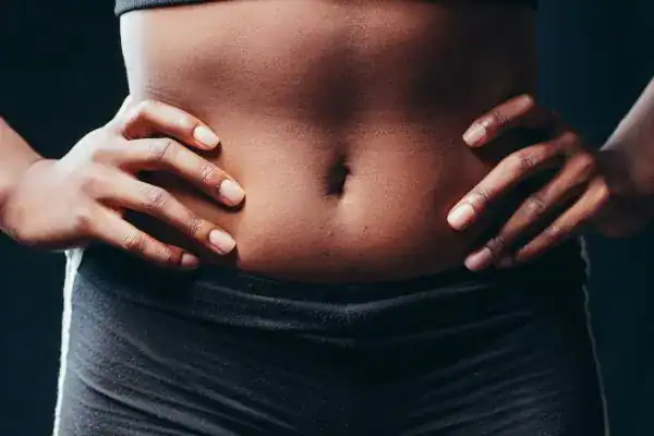Toning Your Stomach: The Ultimate Guide to Achieving a Sculpted Stomach While Shedding Pounds 1 Image of a toned stomach after non surgical treatment Purfleet